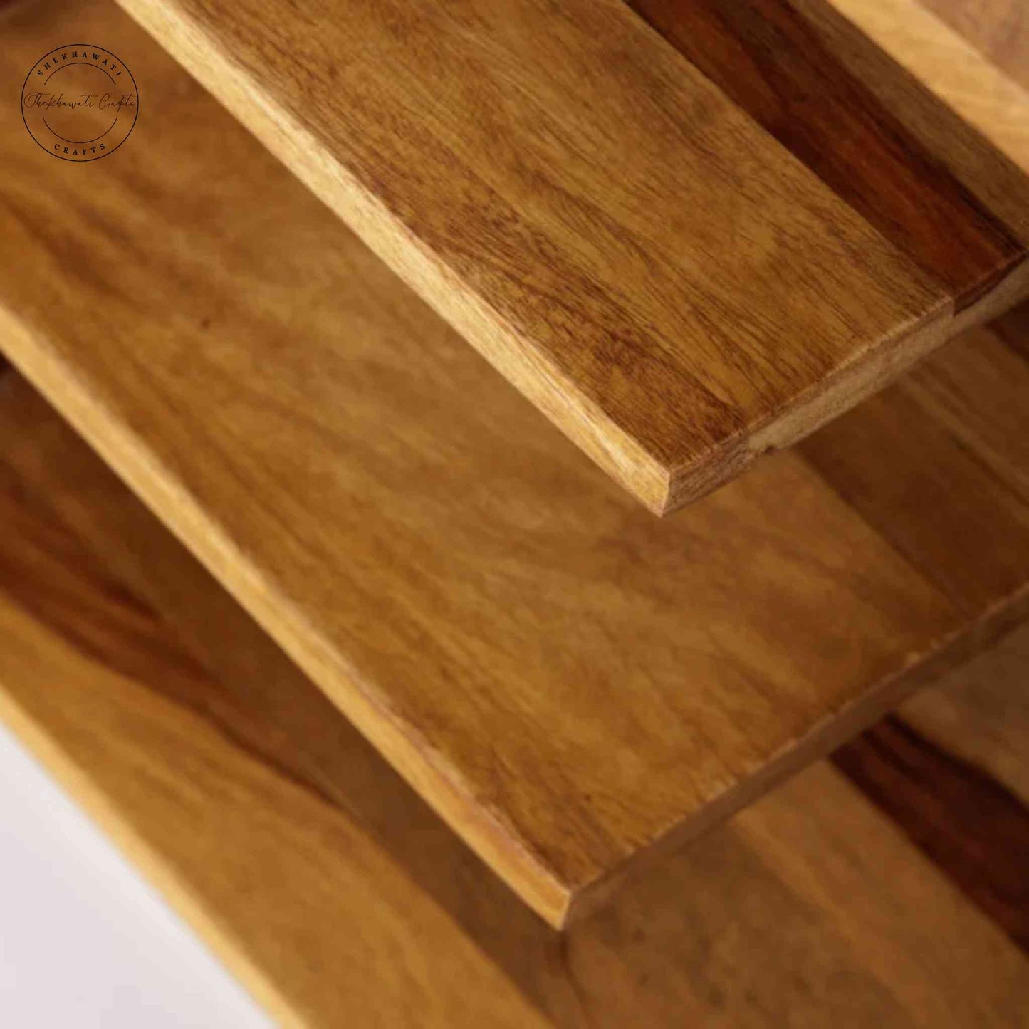 The Aurora end table, crafted from Sheesham wood, is ideal for home and office furniture.