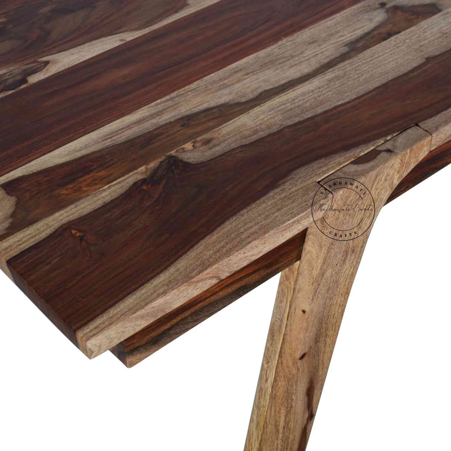 Ava sheesham wood dining table with detachable legs and a natural finish.