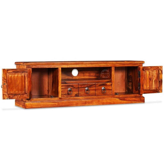 Bakhra TV Cabinet is handcrafted from sheesham wood with a natural finish, 2 hand-carved Bakhra design doors and 1 drawer.