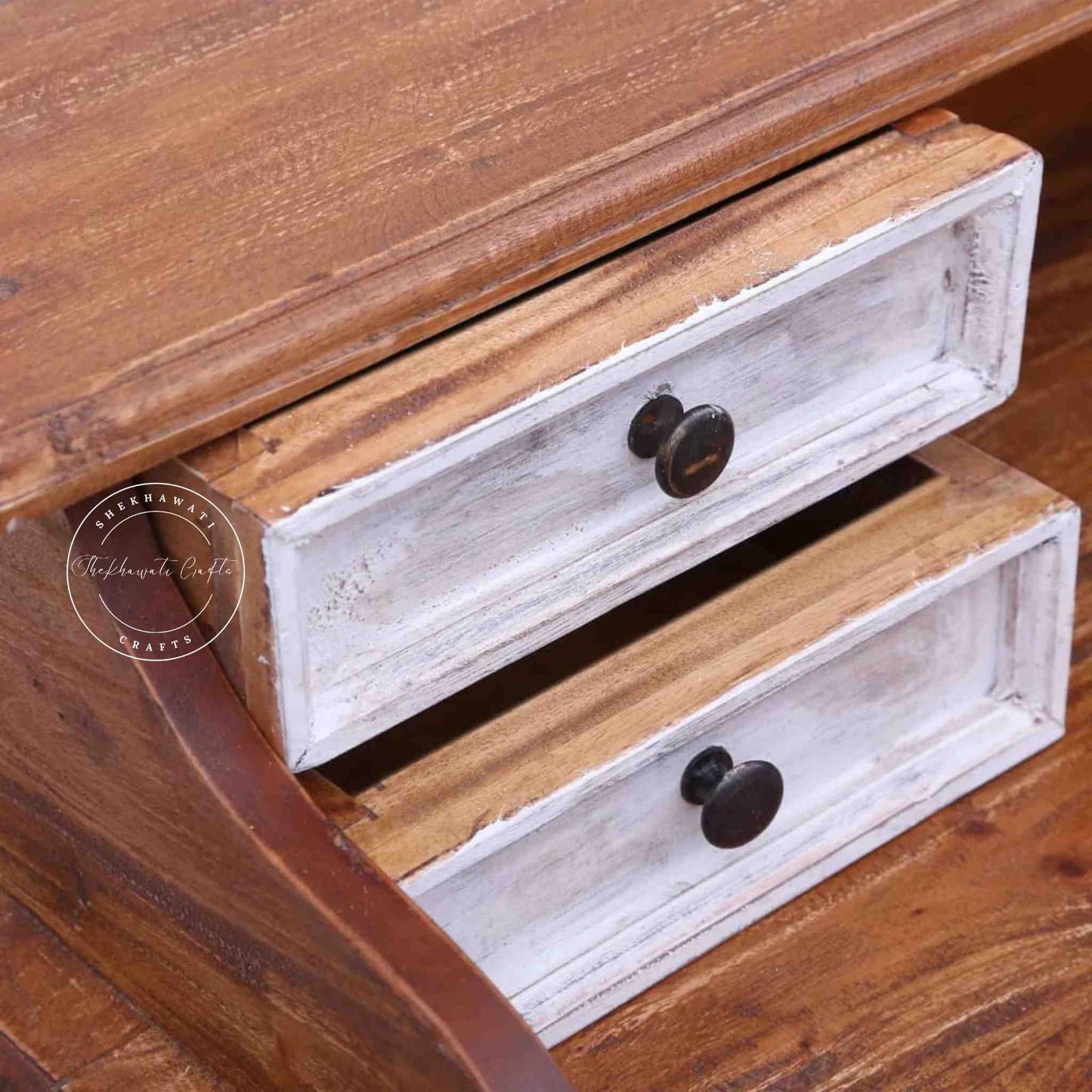 handcrafted Cleo Mango Wood Study Table with 6 drawers, rustic white finish and foldable legs.