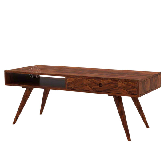 Esha Center Table is handcrafted from Sheesham wood with a honey finish, foldable legs, and a dual-side opening drawer.