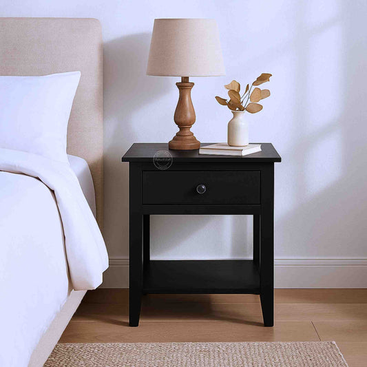 Evie bedside table is crafted from mango wood and a matte black finish.