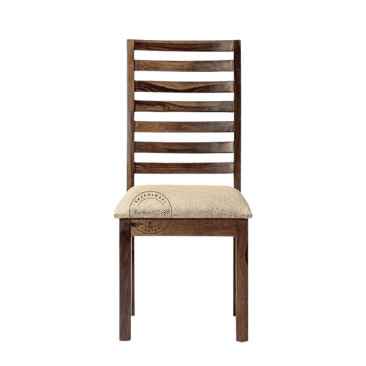 Given Chair is handcrafted from sheesham wood with a unique backrest design, comfortable seating cushion and a modern design.