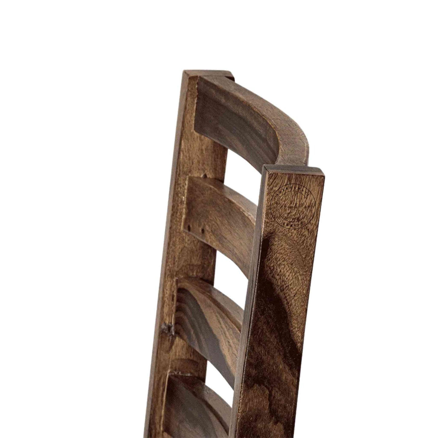 Given Chair is handcrafted from sheesham wood with a unique backrest design, comfortable seating cushion and a modern design.