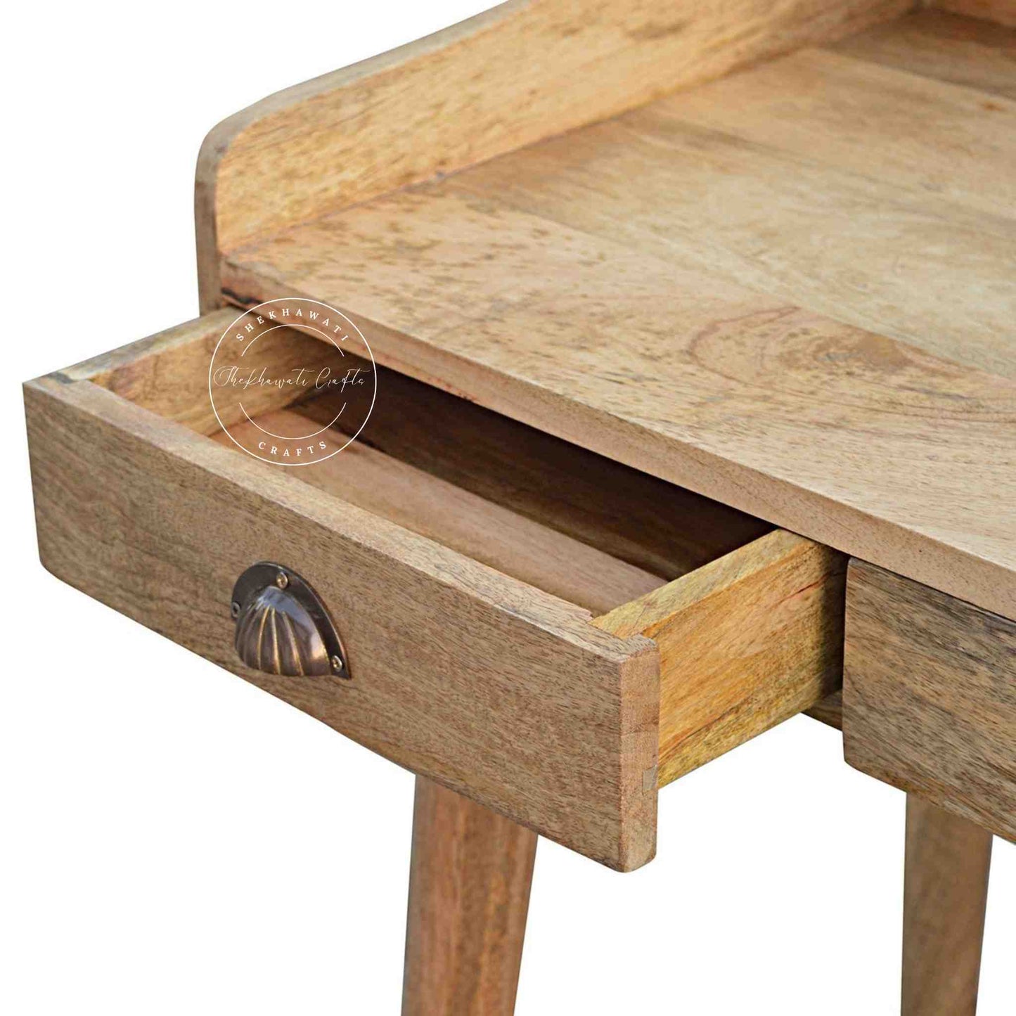 Handcrafted mango wood study desk with detachable legs, three drawers, and a luxurious natural finish for any workspace.