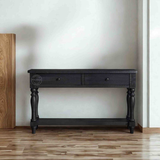 Julian console table is handcrafted from mango wood and a matte black finish.