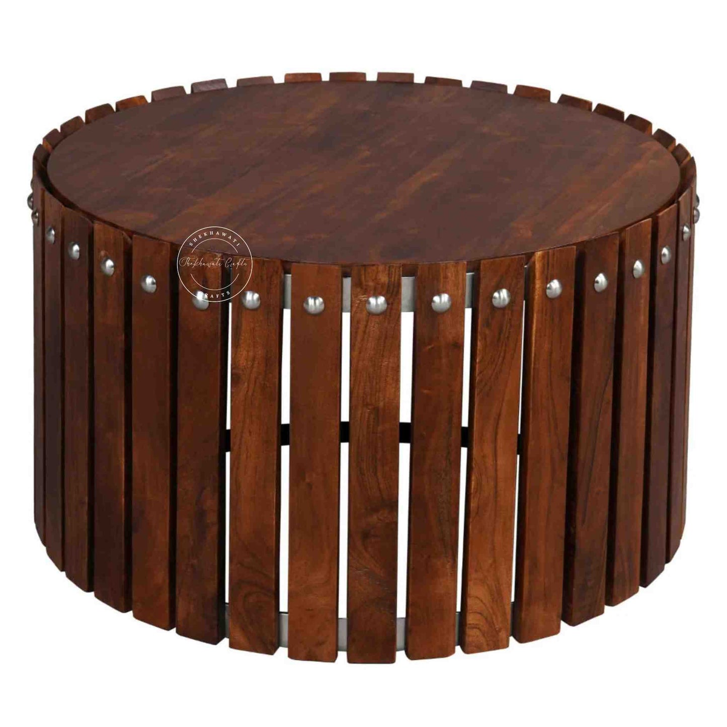 Handcrafted from Sheesham wood, the Leore Coffee Table features a round shape design and warm honey finish.