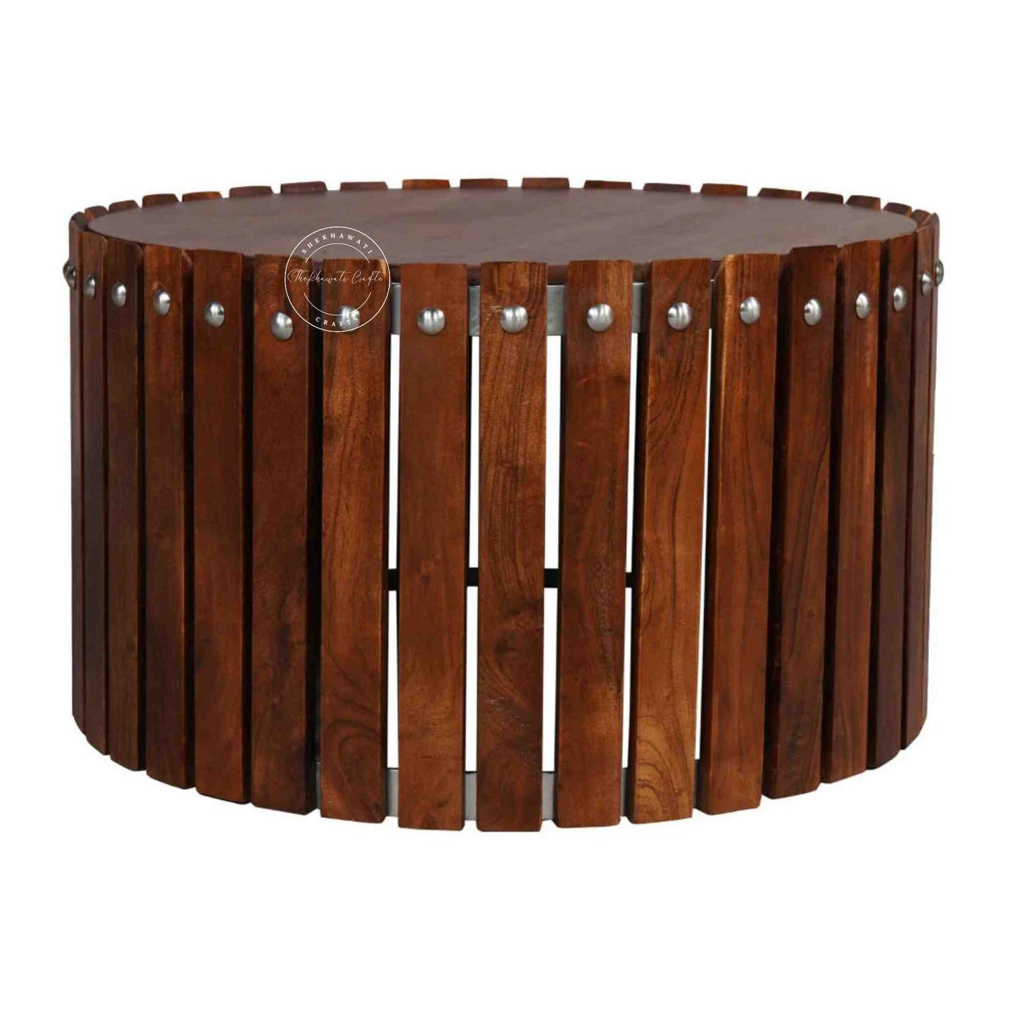 Handcrafted from Sheesham wood, the Leore Coffee Table features a round shape design and warm honey finish.