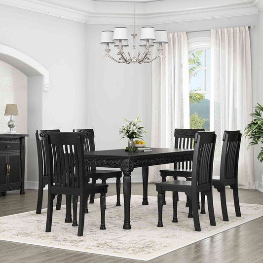 Nobel Dining Table is made from mango wood with a matte black finish, vintage hand-carved design and DIY assembled legs.