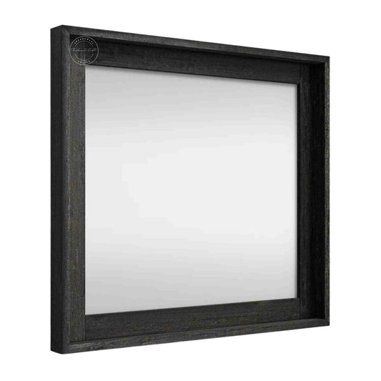 Noir mirror frame is crafted from mango wood with a matte black finish.