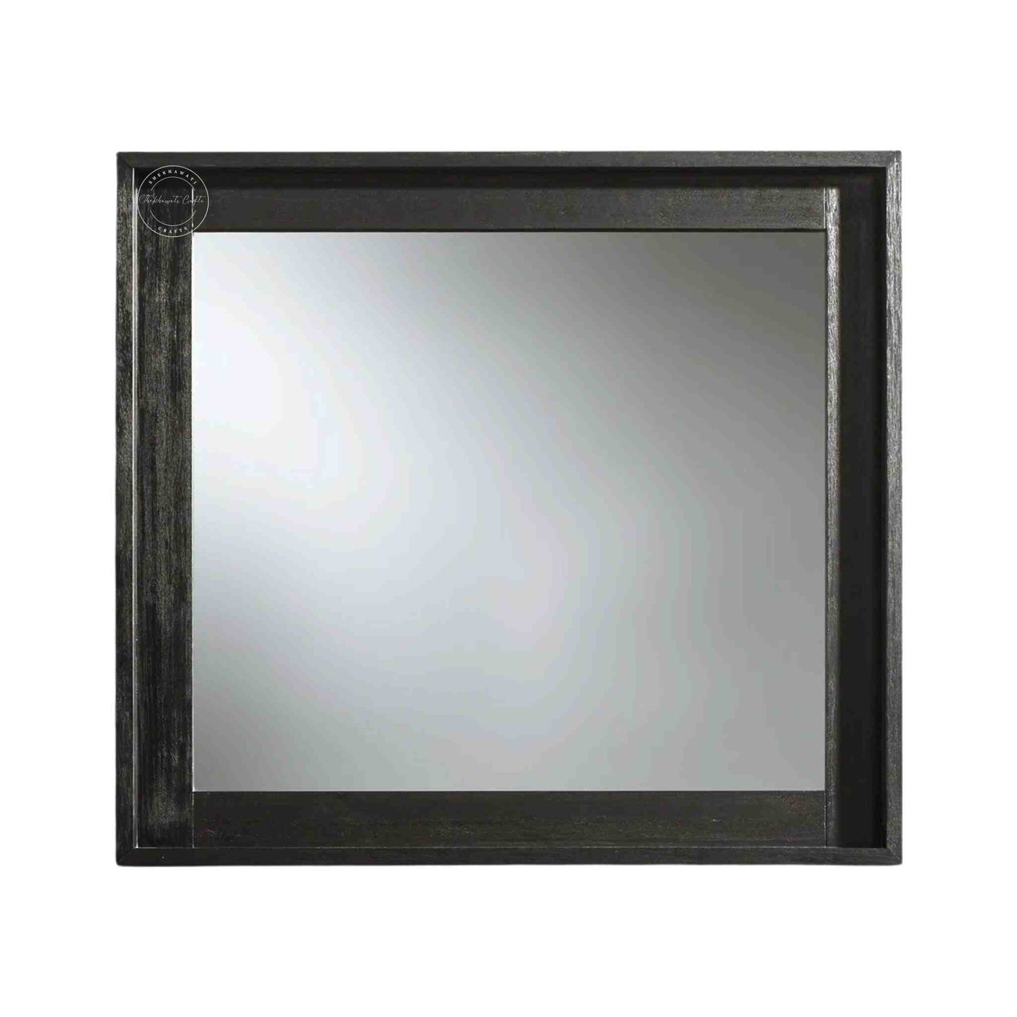 Noir mirror frame is crafted from mango wood with a matte black finish.
