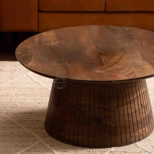 Handcrafted Round coffee table with a natural finish and crafted with mango wood.
