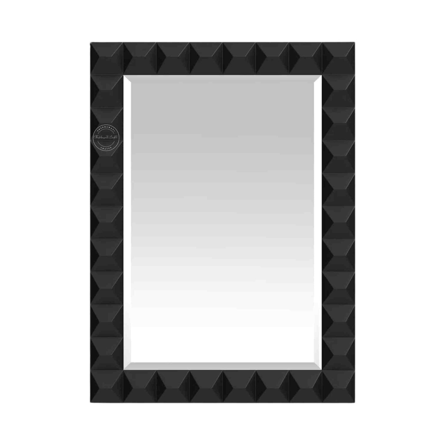 Rocca mirror frame is crafted with mango wood and a matte black finish.