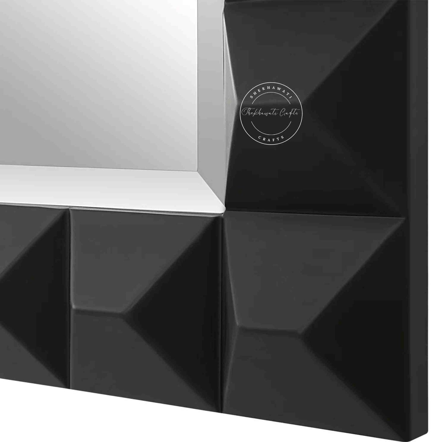 Rocca mirror frame is crafted with mango wood and a matte black finish.