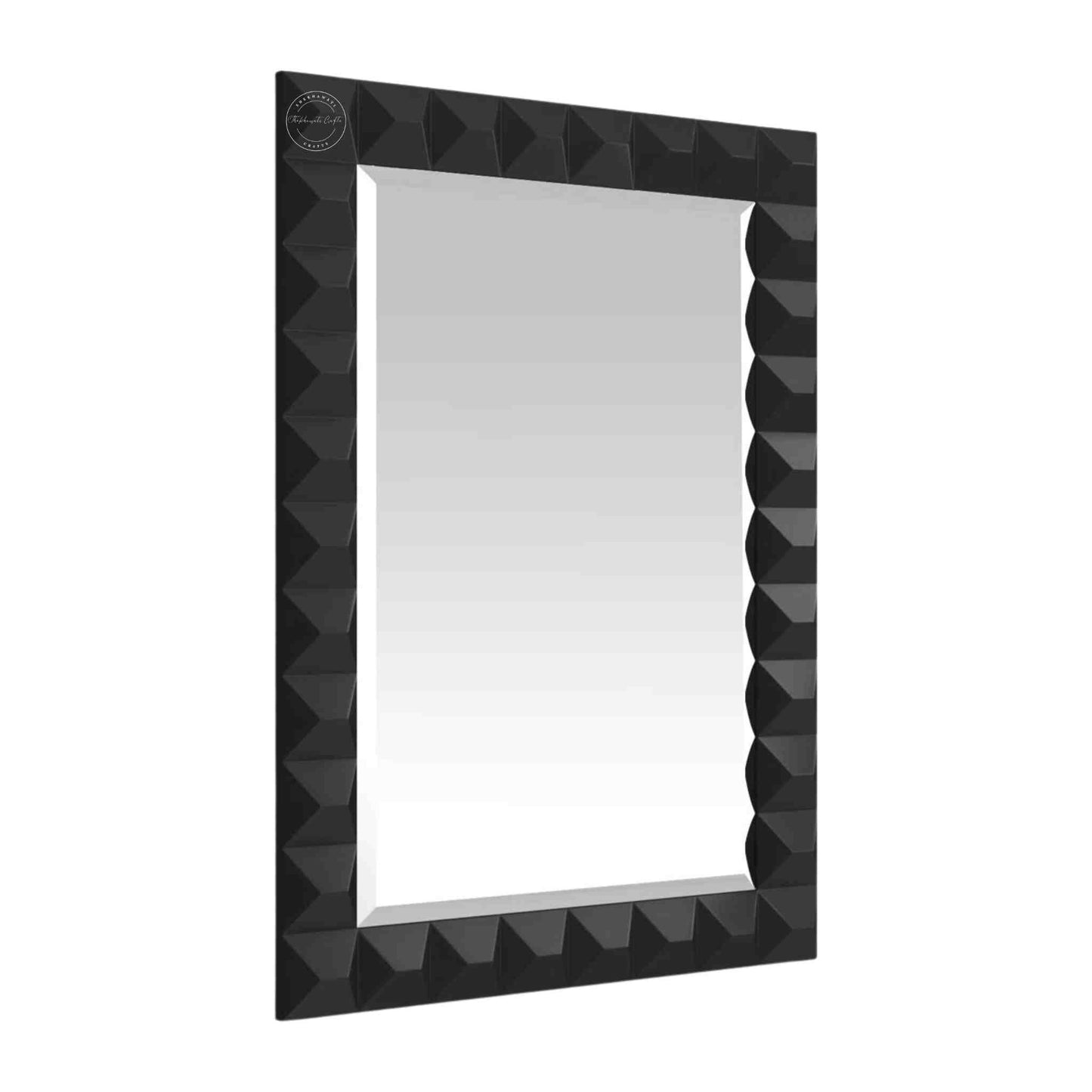 Rocca mirror frame is crafted with mango wood and a matte black finish.