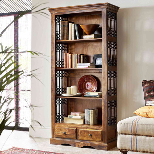 Handcrafted Sheesham wood bookshelf with iron jali, honey finish, 4 shelves and 2 drawers.