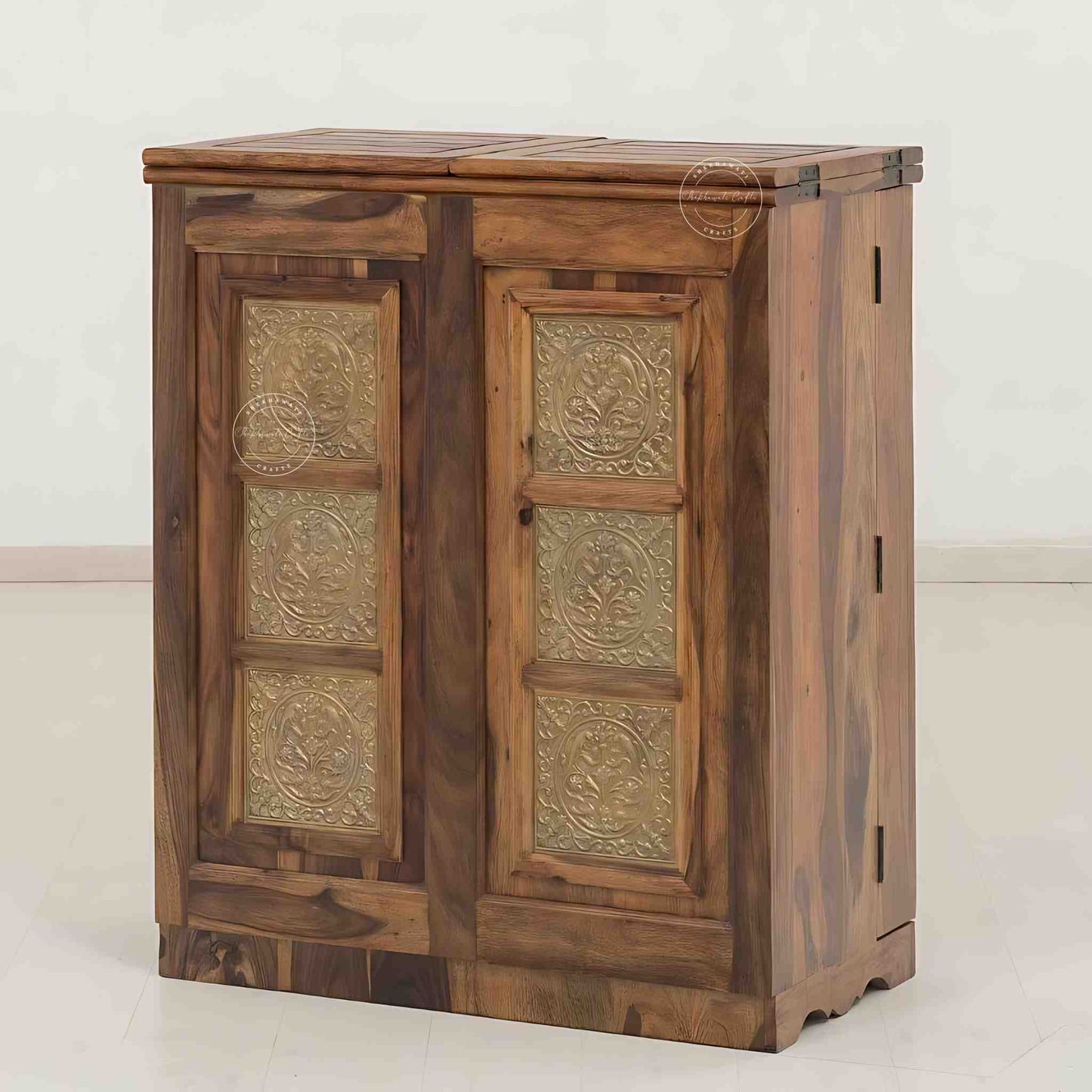 Handcrafted Sheesham wood bar cabinet with antique brass detailing, natural finish, two doors and spacious drawers.