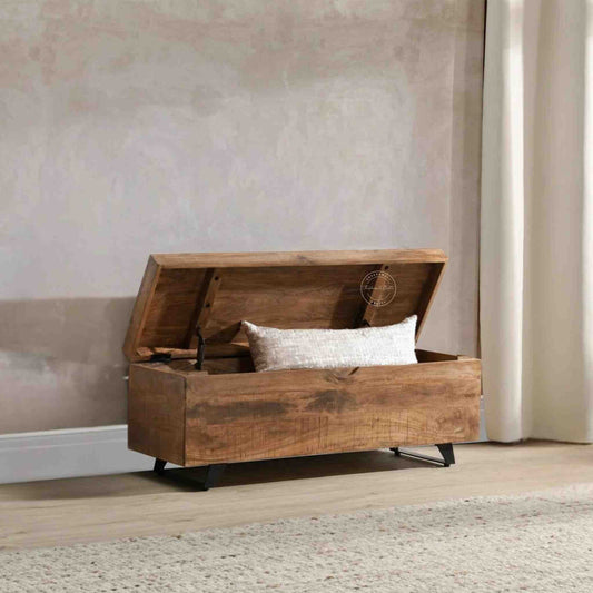 Soren storage bench made from mango wood and iron legs with natural finish and storage.