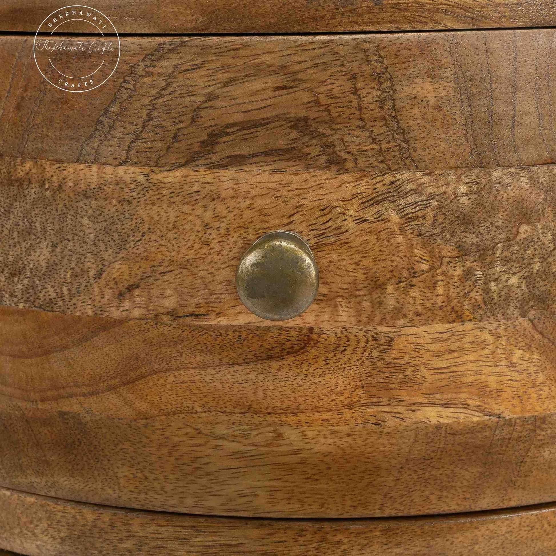 Teshio 4 drawer round shape accent side table with natural finish.
