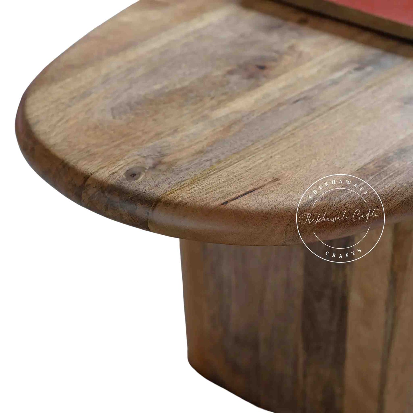 Handcrafted Tiara Mango Wood Coffee Table featuring an oval design and foldable legs.