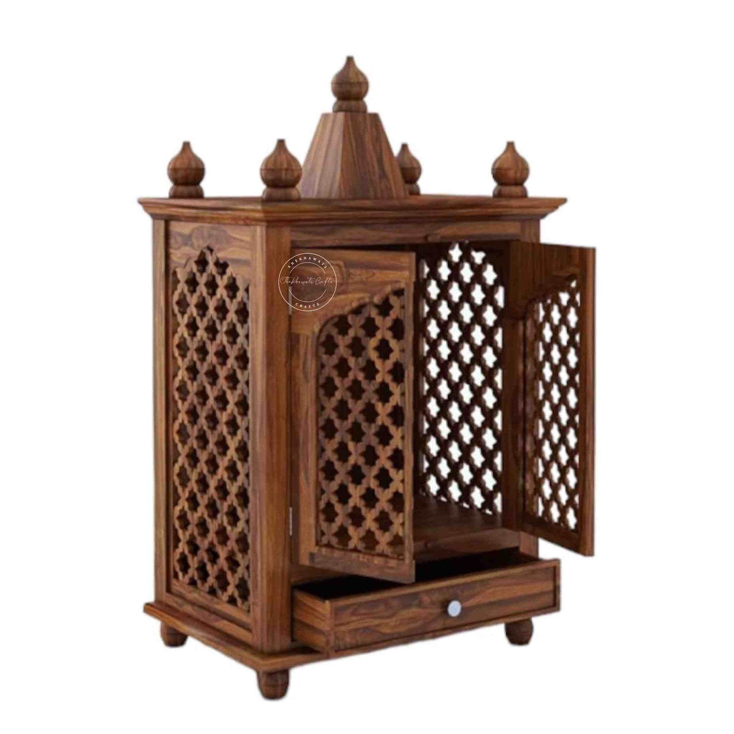 Trayee wooden temple is handcrafted from sheesham wood and features a unique Shekhawati wooden jali design, complete with 2 doors and 1 drawer.
