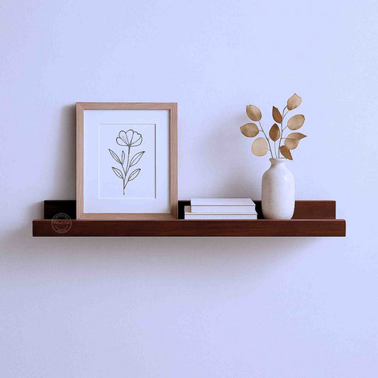 handcrafted Veda mango wood hanging wall shelf in honey finish.
