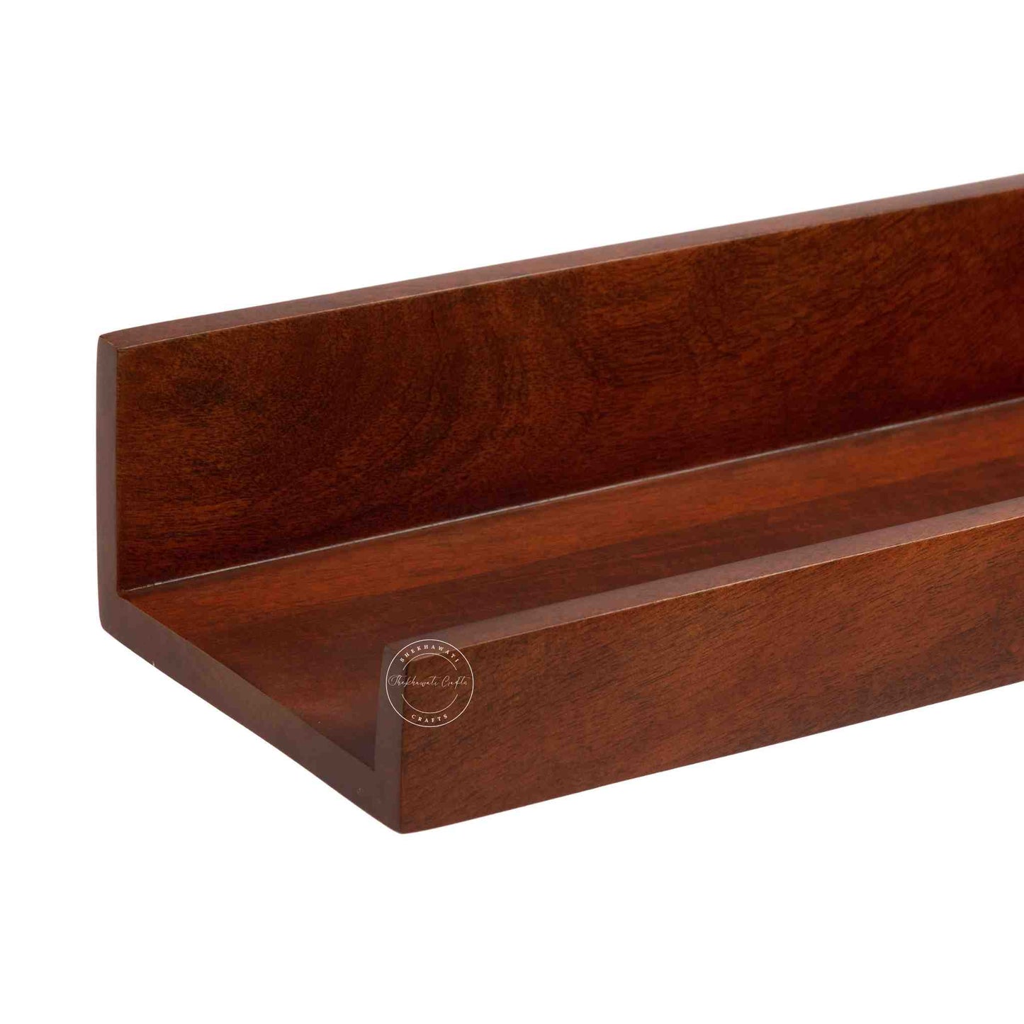 handcrafted Veda mango wood hanging wall shelf in honey finish.