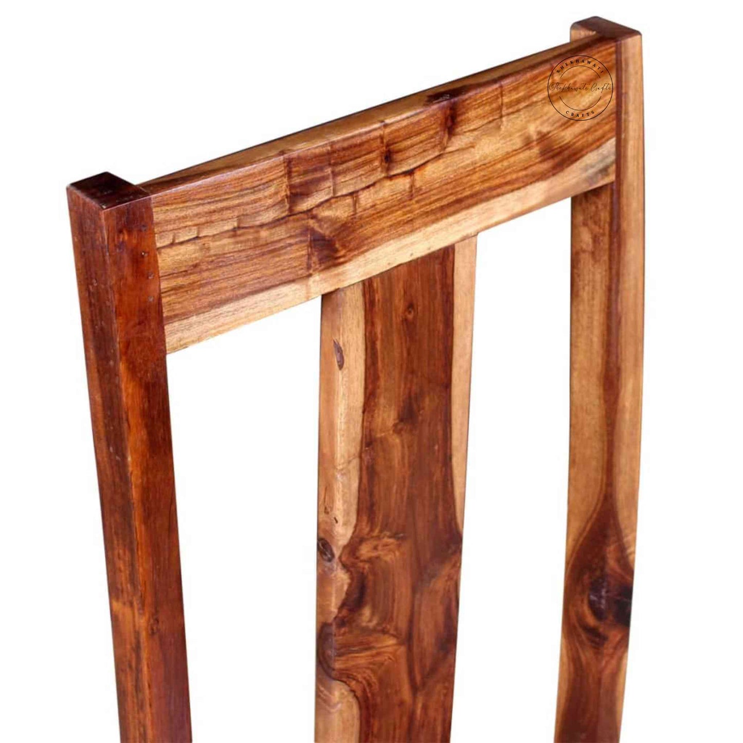 Vira Chair is handcrafted with sheesham wood and natural finish.