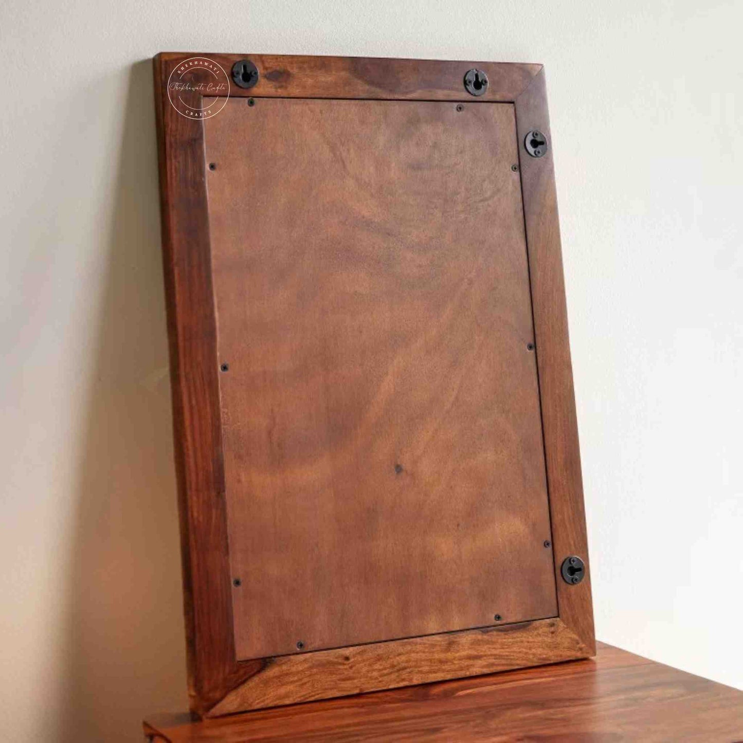 Razi mirror photo frame is handcrafted with sheesham wood and a honey finish, It can be hang vertically or horizontally.