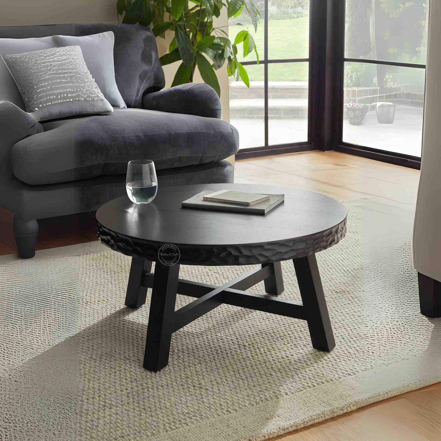 Uma coffee table is handcrafted from sheesham wood with a round shape design.