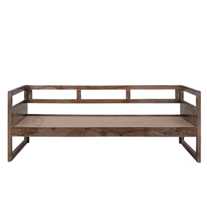 A foldable wooden daybed made of Sheesham wood with natural finish sits in a white background.