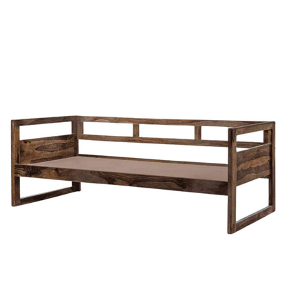 Side view of a foldable wooden daybed made of Sheesham wood with natural finish sits in a white background.