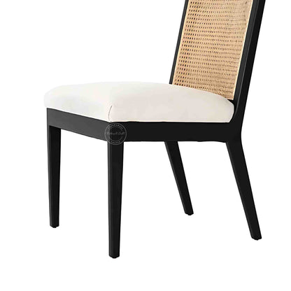handcrafted Anvi Chair is made with sheesham wood and ratan cane design backrest.