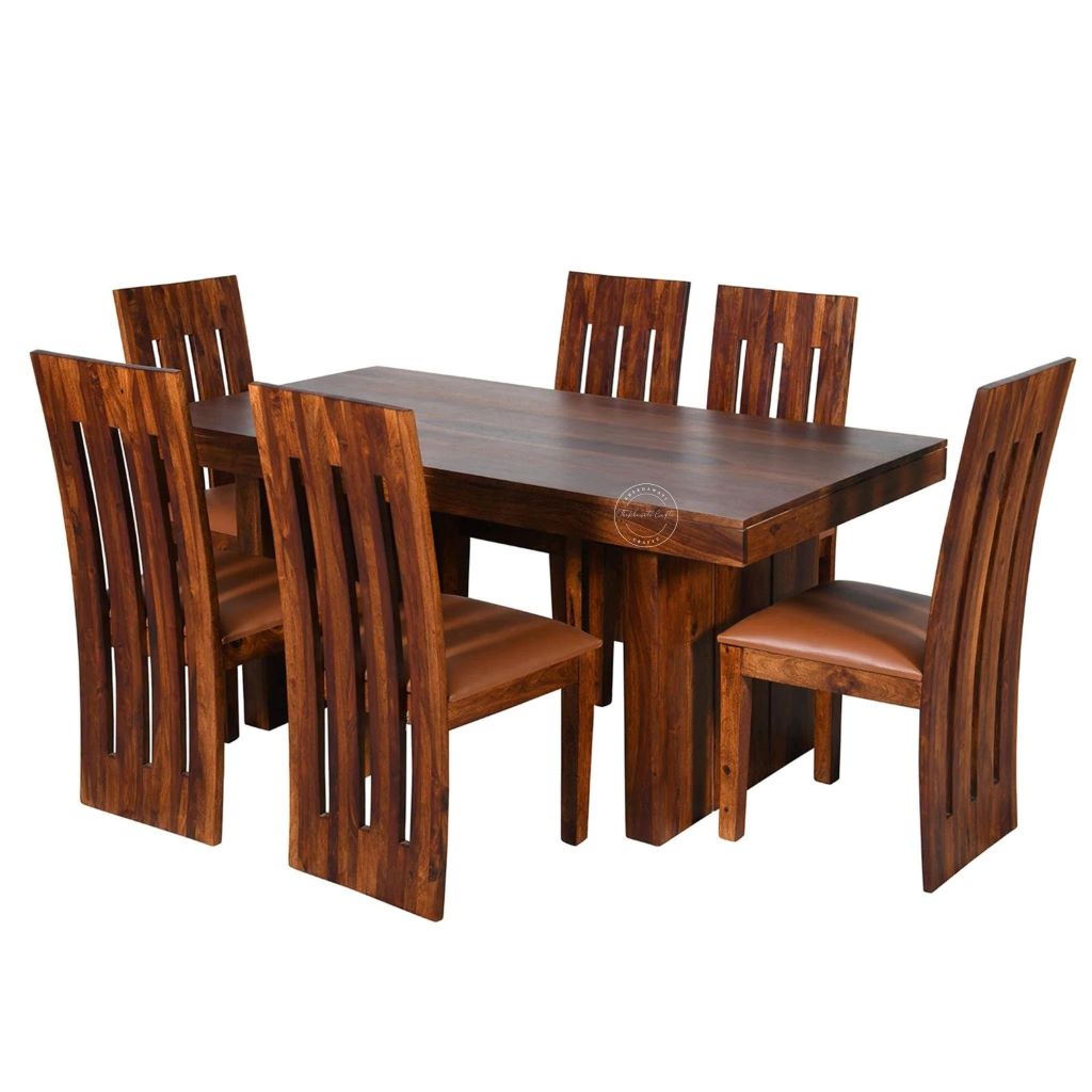 A wooden dining set featuring a rectangular table and six matching slatted-back chairs with brown leather seats, shown on a plain white background.