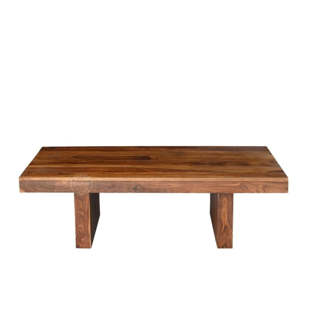 A rectangular sheesham wood centre table with a thick live-edge top and two block-style legs, shown against a plain white background.