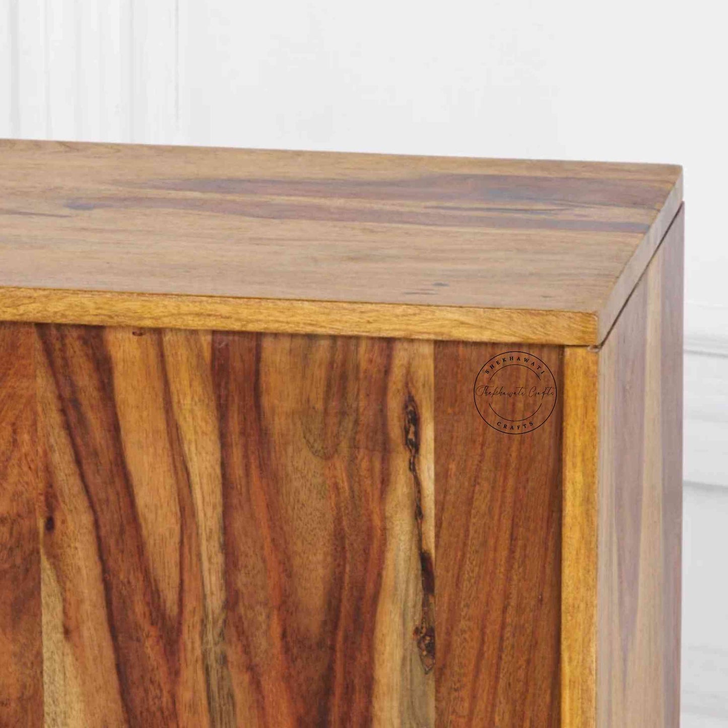 The Aurora end table, crafted from Sheesham wood, is ideal for home and office furniture.