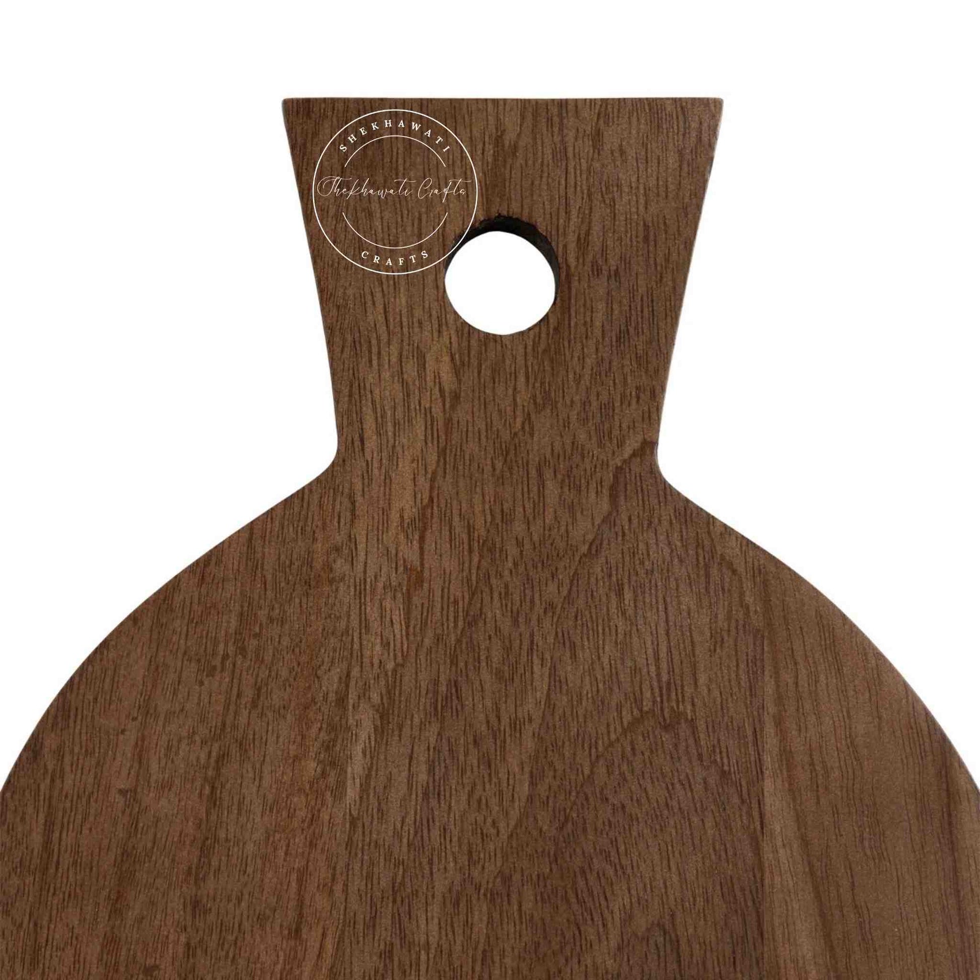 Bae Wall Mounted Shelf is handcrafted from mango wood and honey finish with a unique design for home decor.