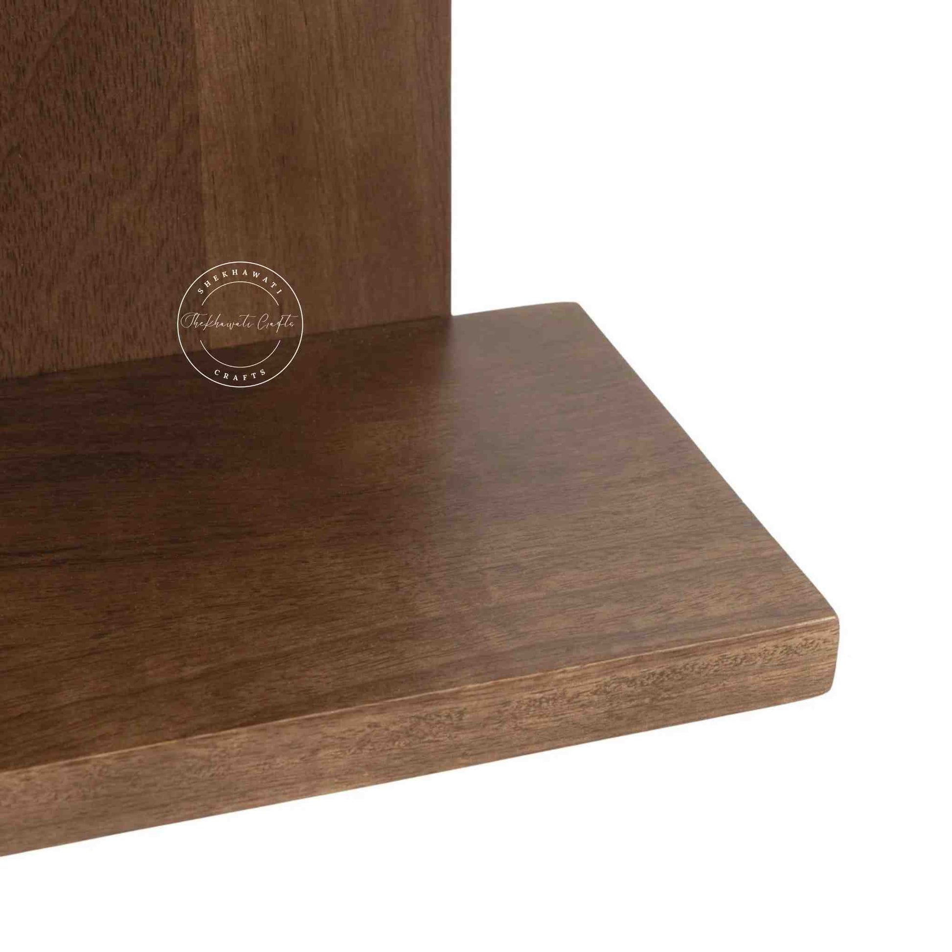 Bae Wall Mounted Shelf is handcrafted from mango wood and honey finish with unique design