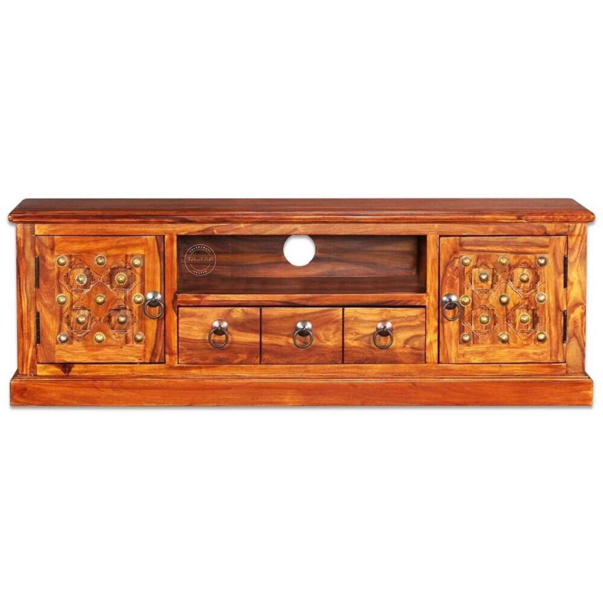 Bakhra TV Cabinet is handcrafted from sheesham wood with a natural finish, 2 Bakhra design doors and 1 drawer.