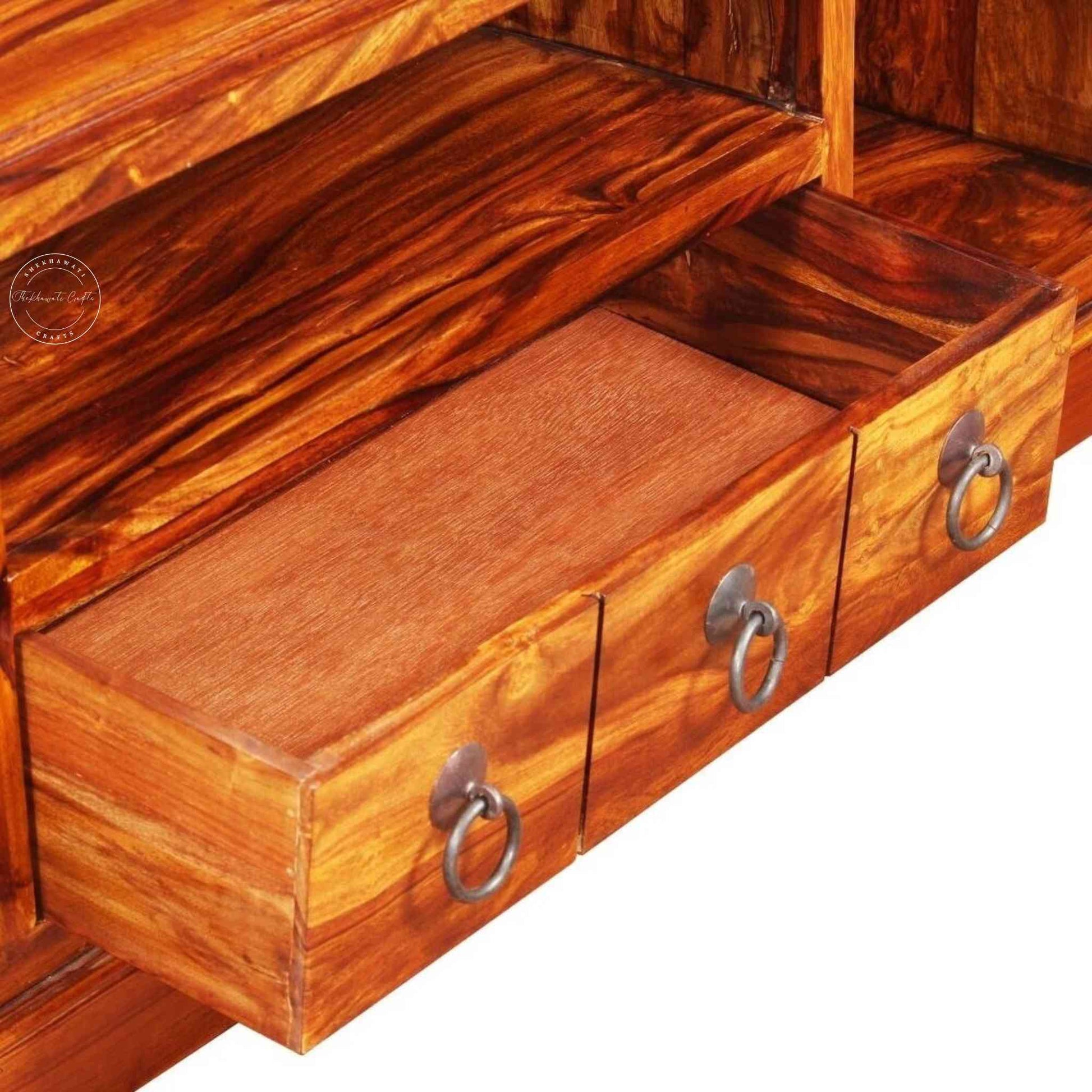Bakhra TV Cabinet is handcrafted from sheesham wood with a natural finish, 2 Bakhra design doors and 1 drawer.