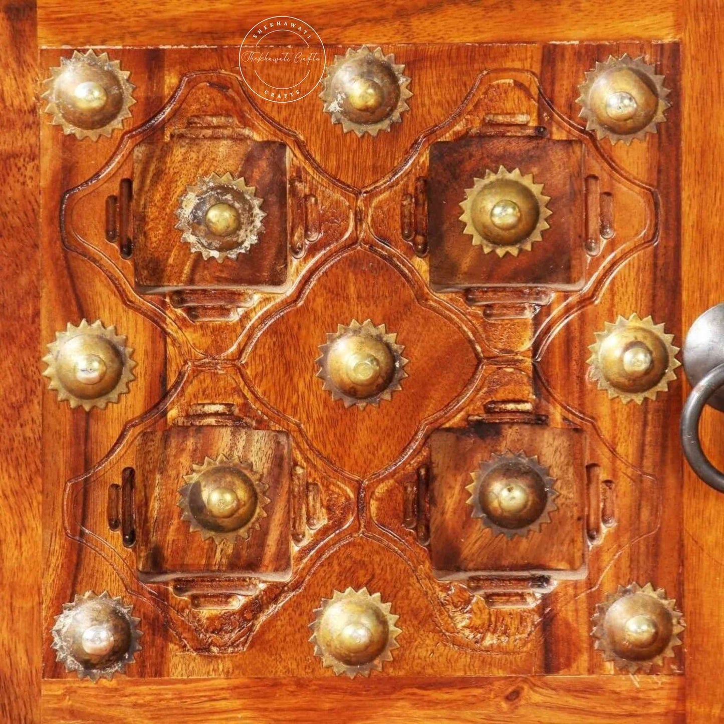 Bakhra TV Cabinet is handcrafted from sheesham wood with a natural finish, 2 Bakhra design doors and 1 drawer.