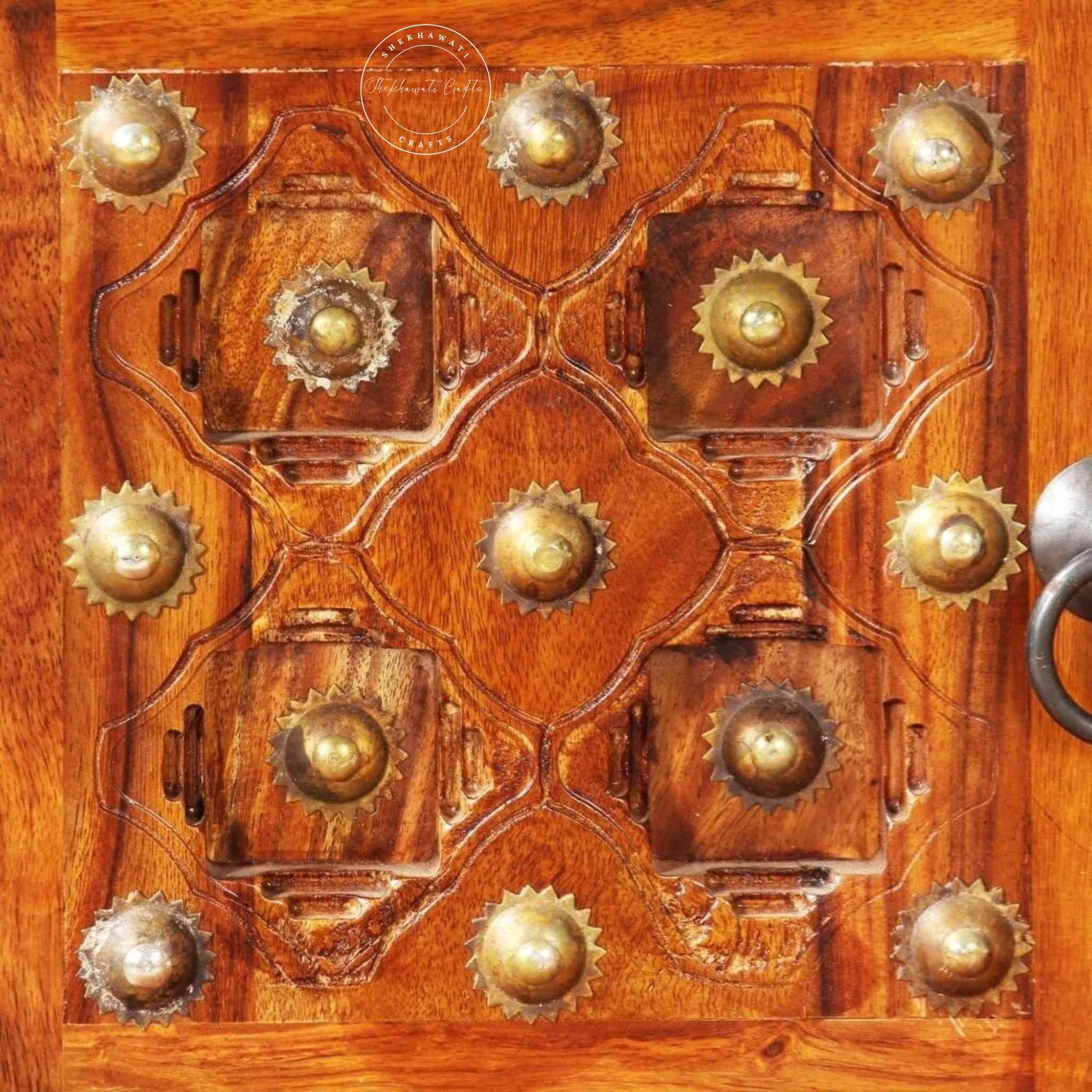 Bakhra TV Cabinet is handcrafted from sheesham wood with a natural finish, 2 Bakhra design doors and 1 drawer.