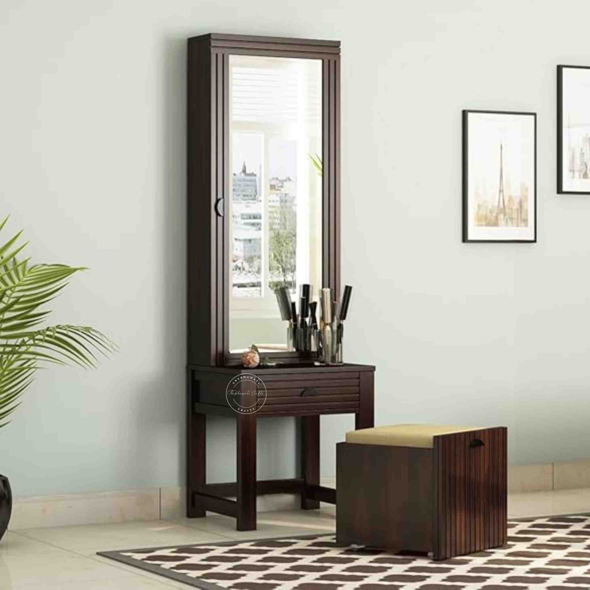 The Bergen dressing table is handcrafted from sheesham wood, featuring a mirrored storage door, one drawer, and a stool with storage options.