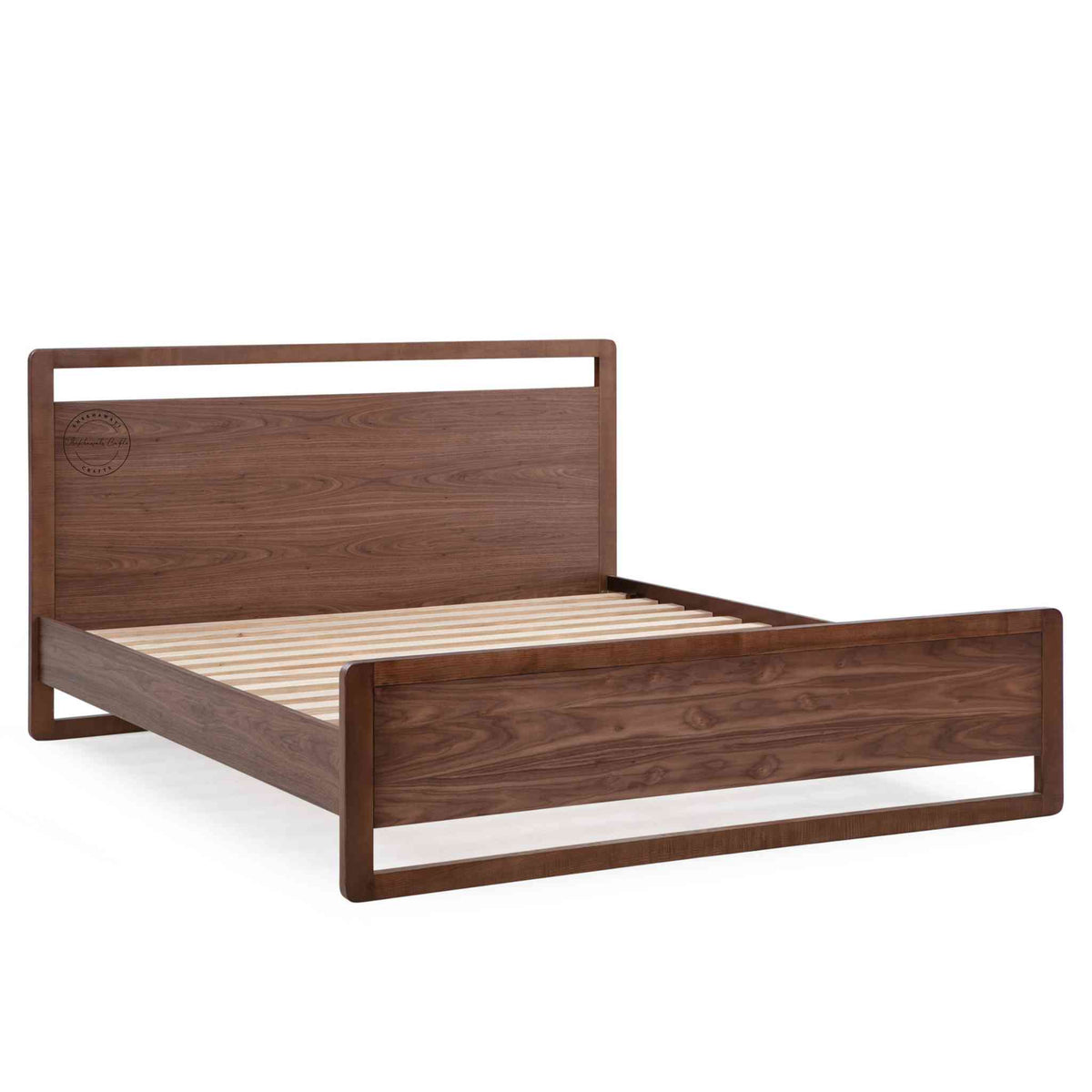 side view of a king-size bed made of Sheesham wood with a headboard and footboard in white background.