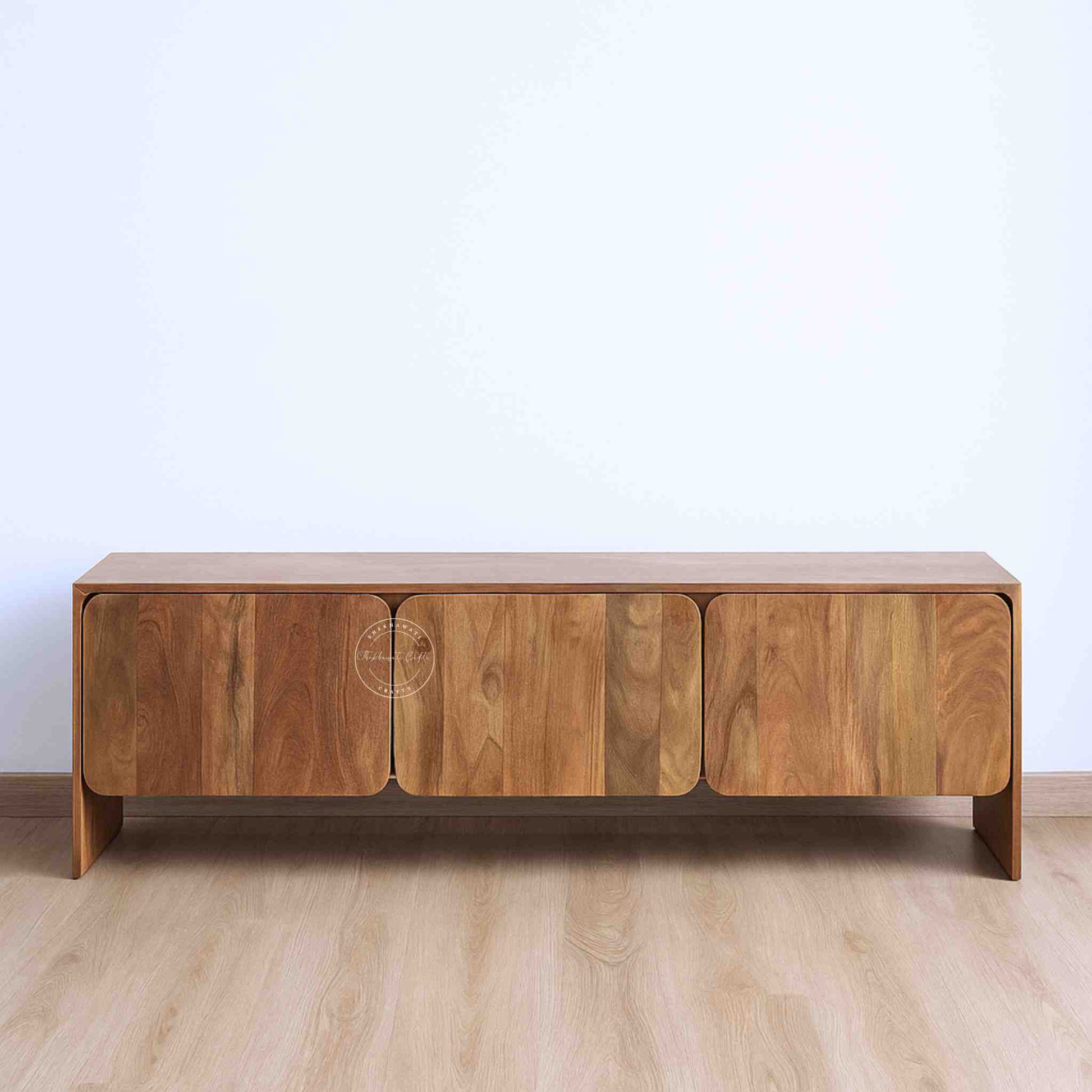 handmade Cove Solid Wood Media Cabinet is made from mango wood and a natural finish with 3 doors.