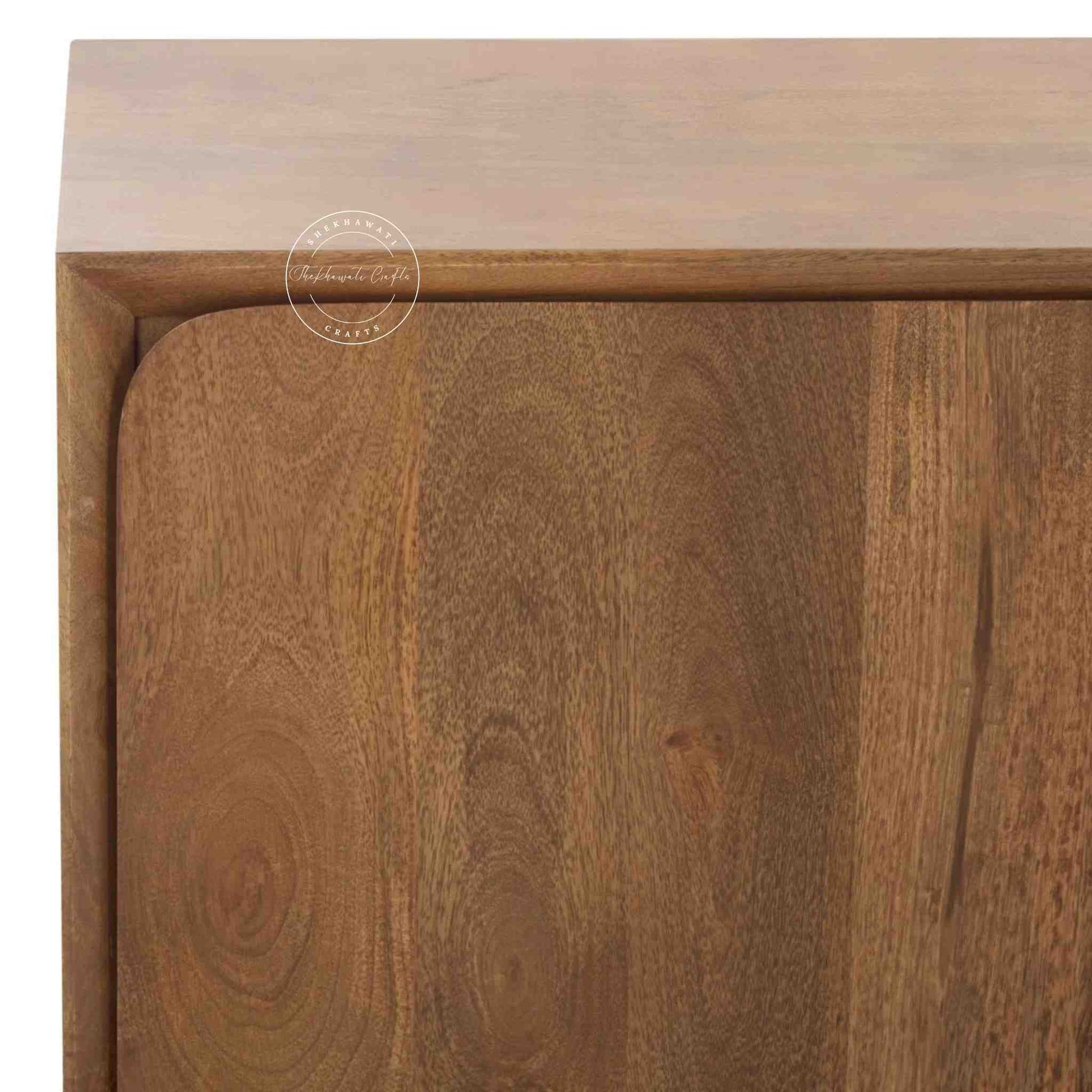 handmade Cove Solid Wood Media Cabinet is made from mango wood and a natural finish with 3 doors.