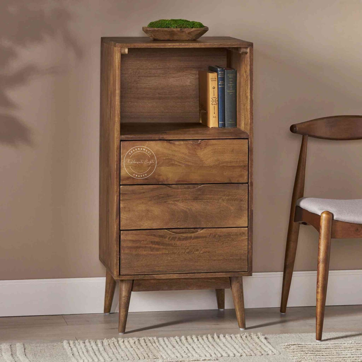Eddy Chest of Drawer crafted from Mango wood with a natural finish, offering 3 drawers, an open shelf, and detachable legs for easy portability and termite-free durability.