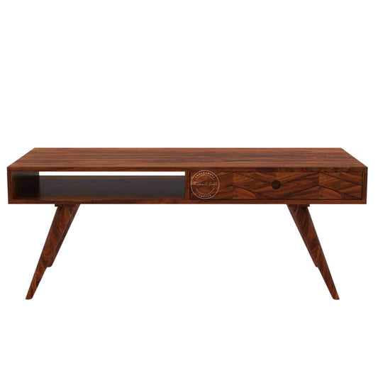Esha Center Table is handcrafted from Sheesham wood with a honey finish, foldable legs, and a dual-side opening drawer.