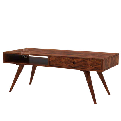Esha Center Table is handcrafted from Sheesham wood with a honey finish, foldable legs, and a dual-side opening drawer.