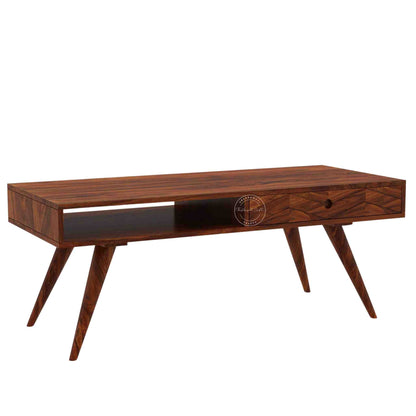 Esha Center Table is handcrafted from Sheesham wood with a honey finish, foldable legs, and a dual-side opening drawer.